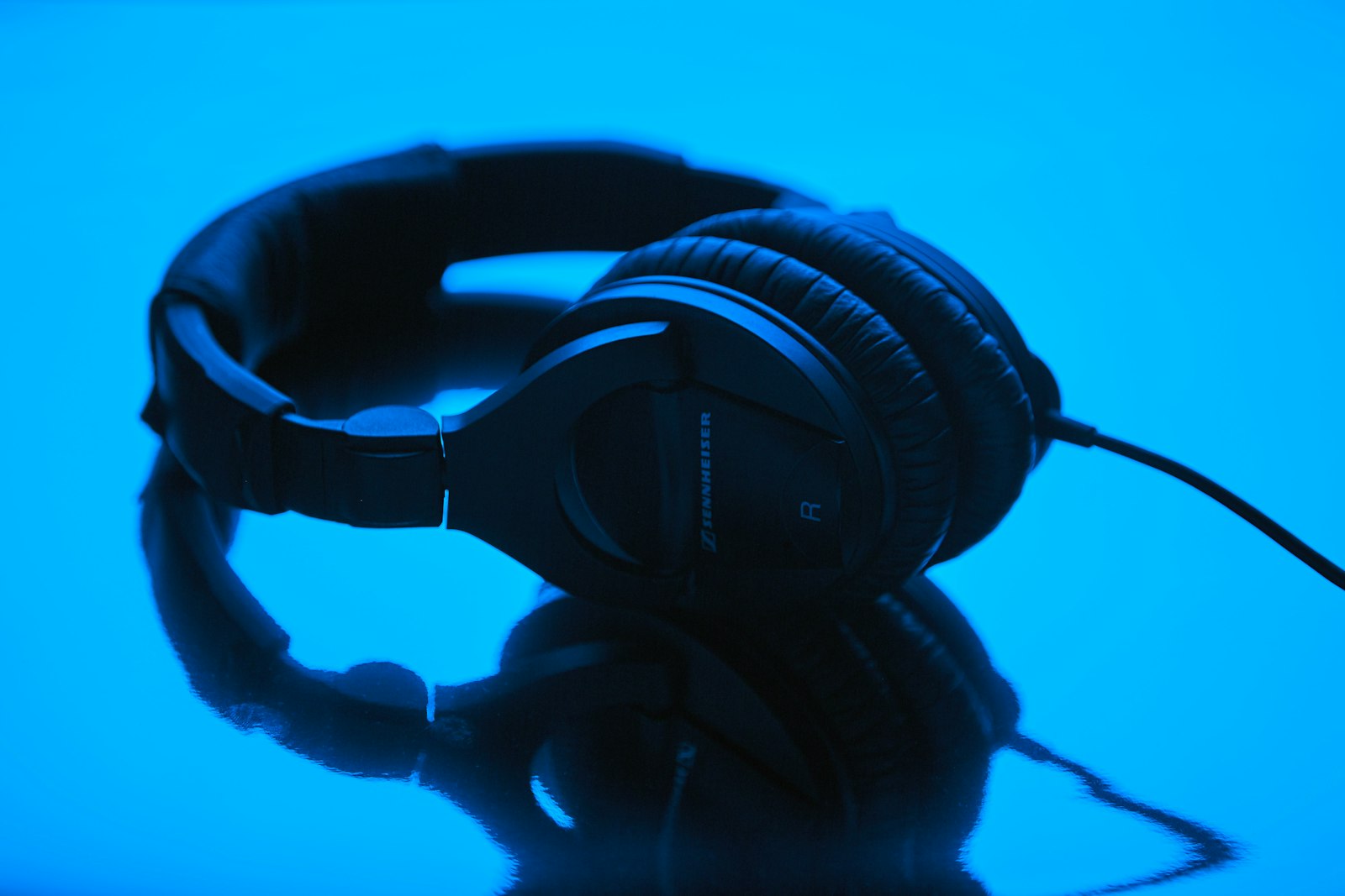 Studio headphones in deep blue light