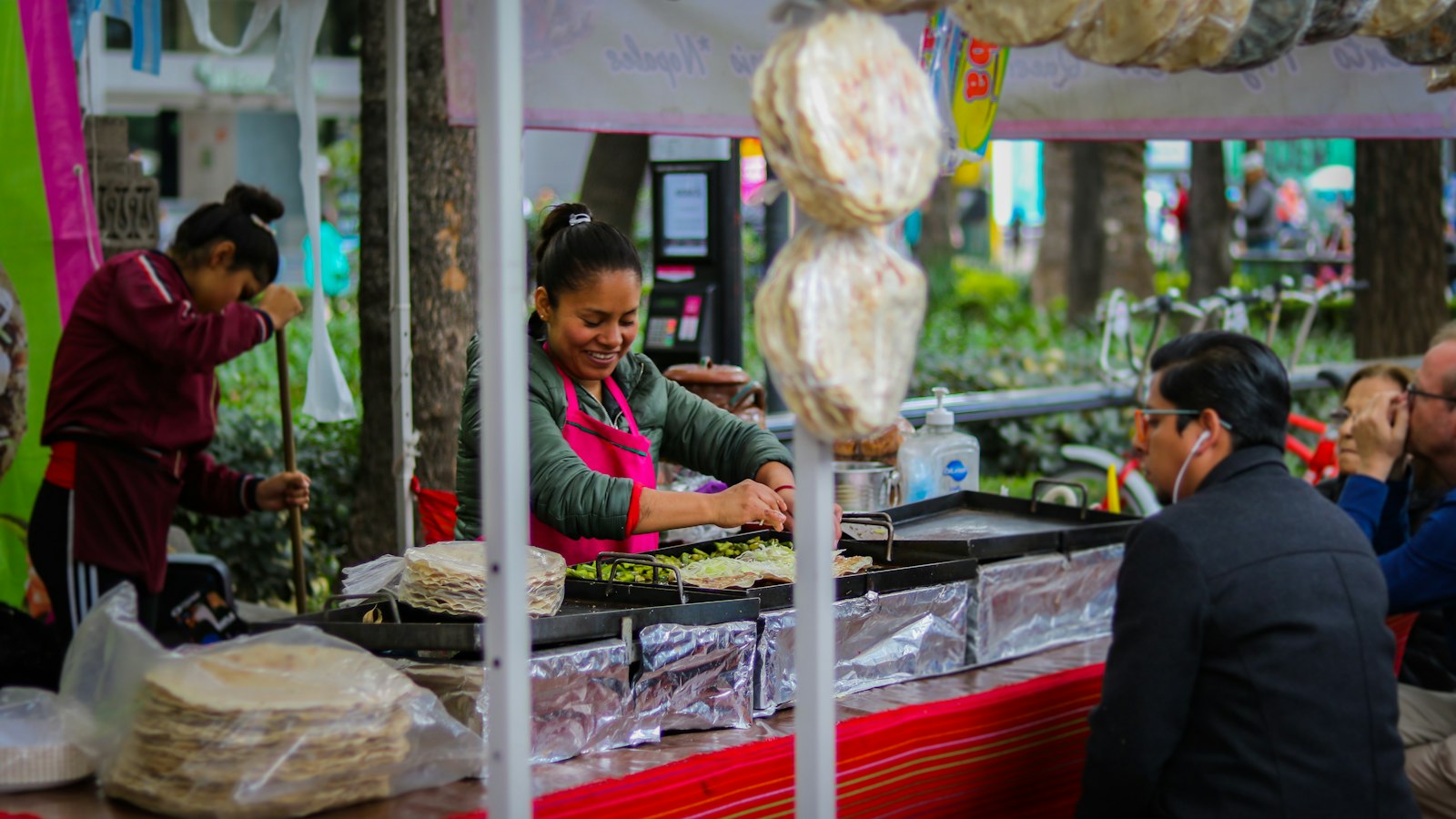 A street stall making tortillas at the griddle