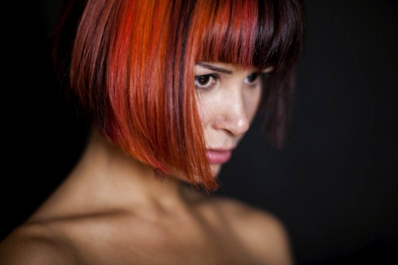 A client with freshly coloured red hair