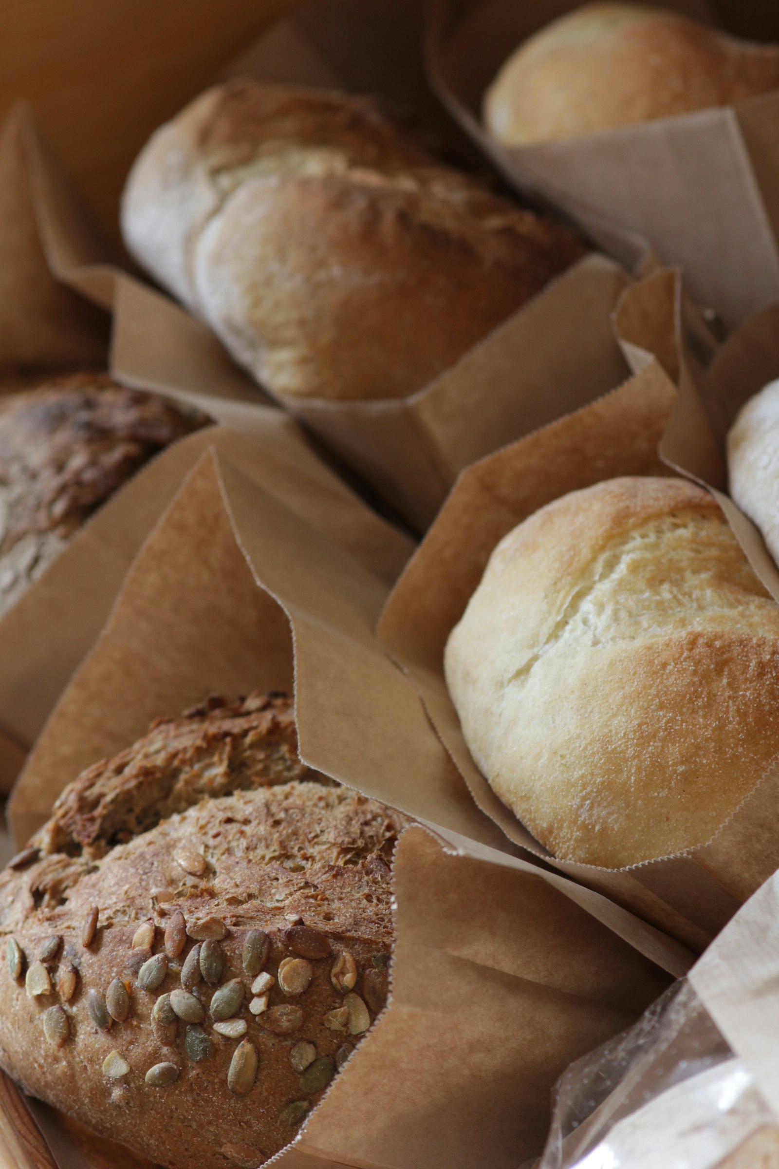 Loaves in brown paper bags
