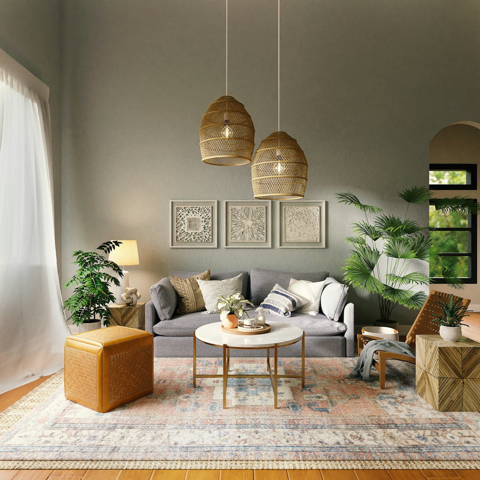 A grey sofa under three rattan pendants with a round marble table