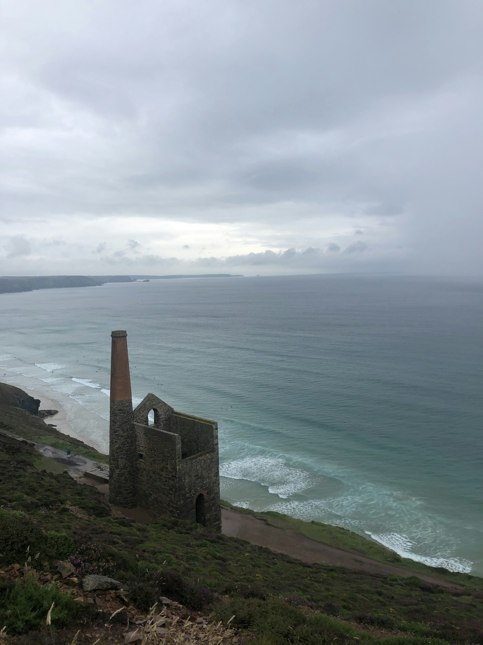 A Cornish engine house ruin on a clifftop above the sea