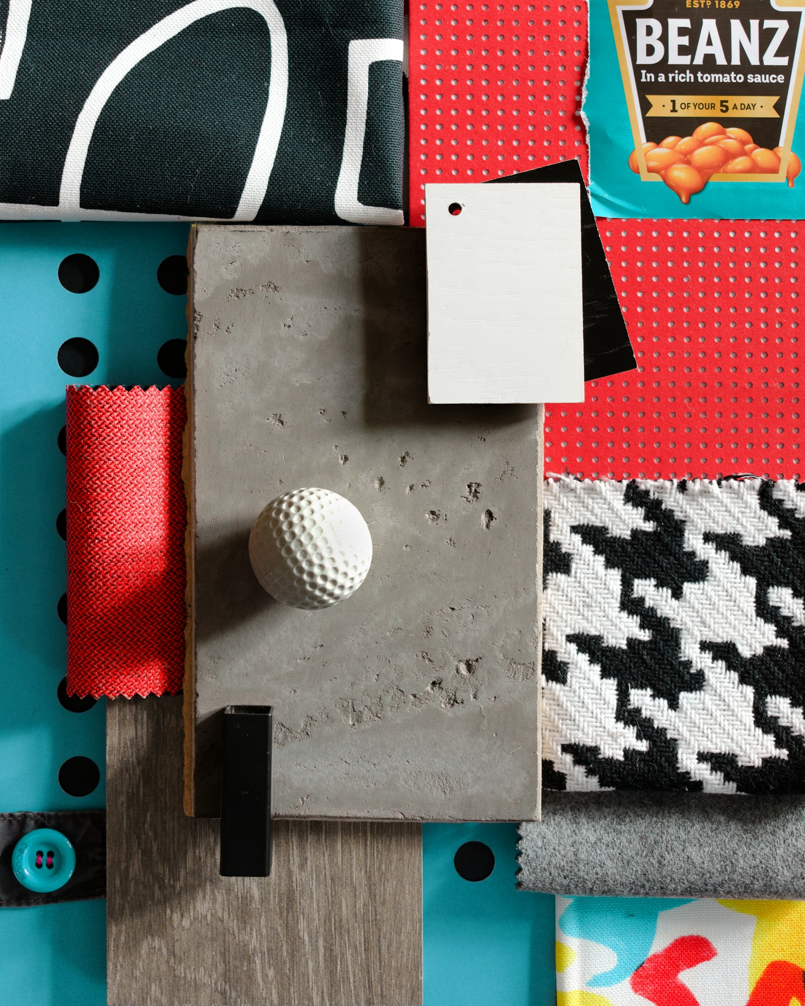 Fabric swatches and a concrete sample on a table
