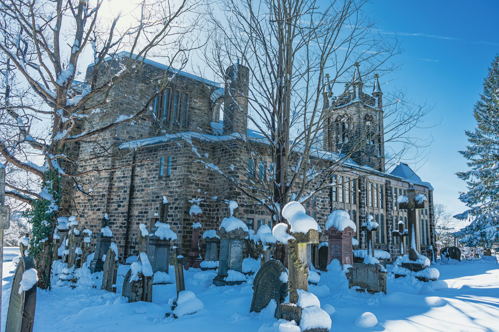 The church and churchyard under snow