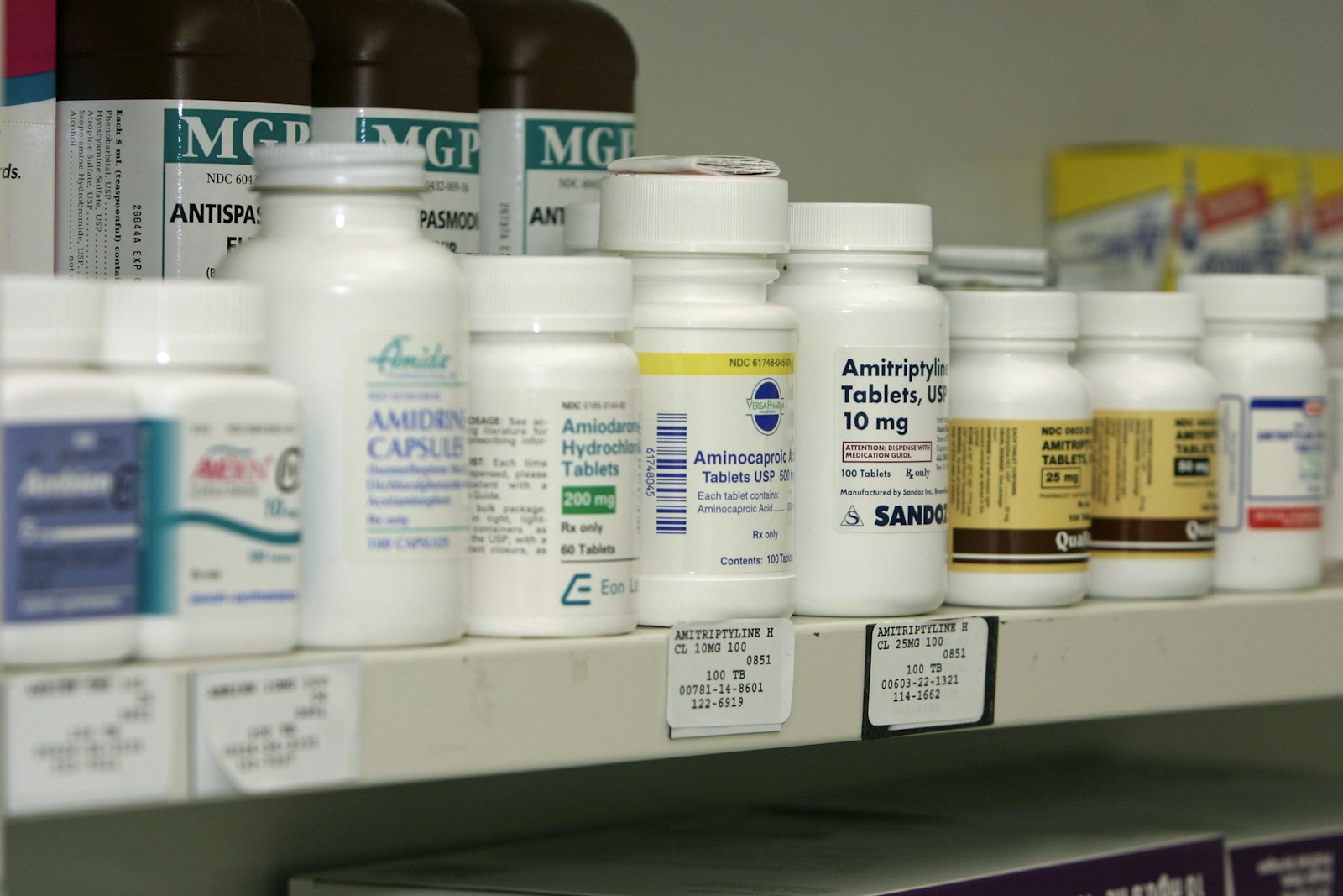 A dispensary shelf of bottles