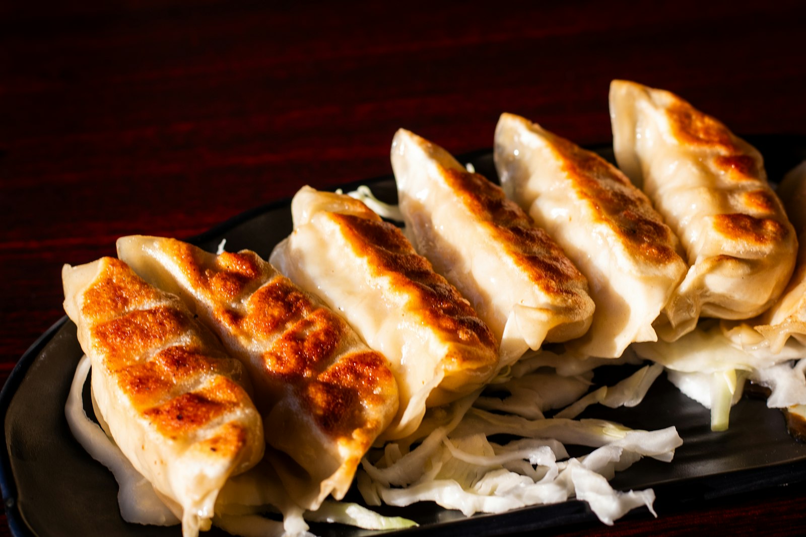 Pan-fried gyoza with crisp golden bottoms