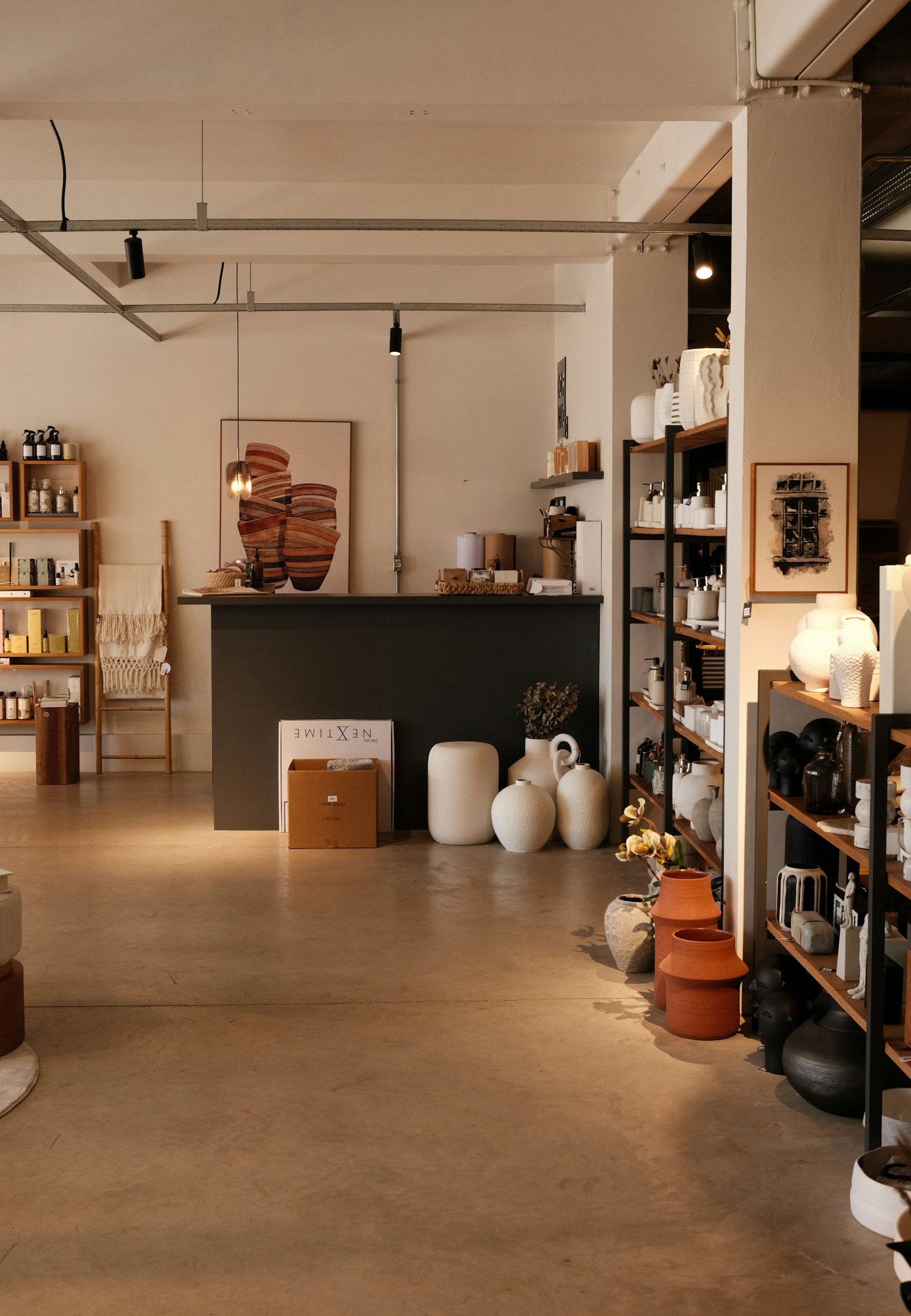 An independent ceramics and homeware shop with vases on shelves
