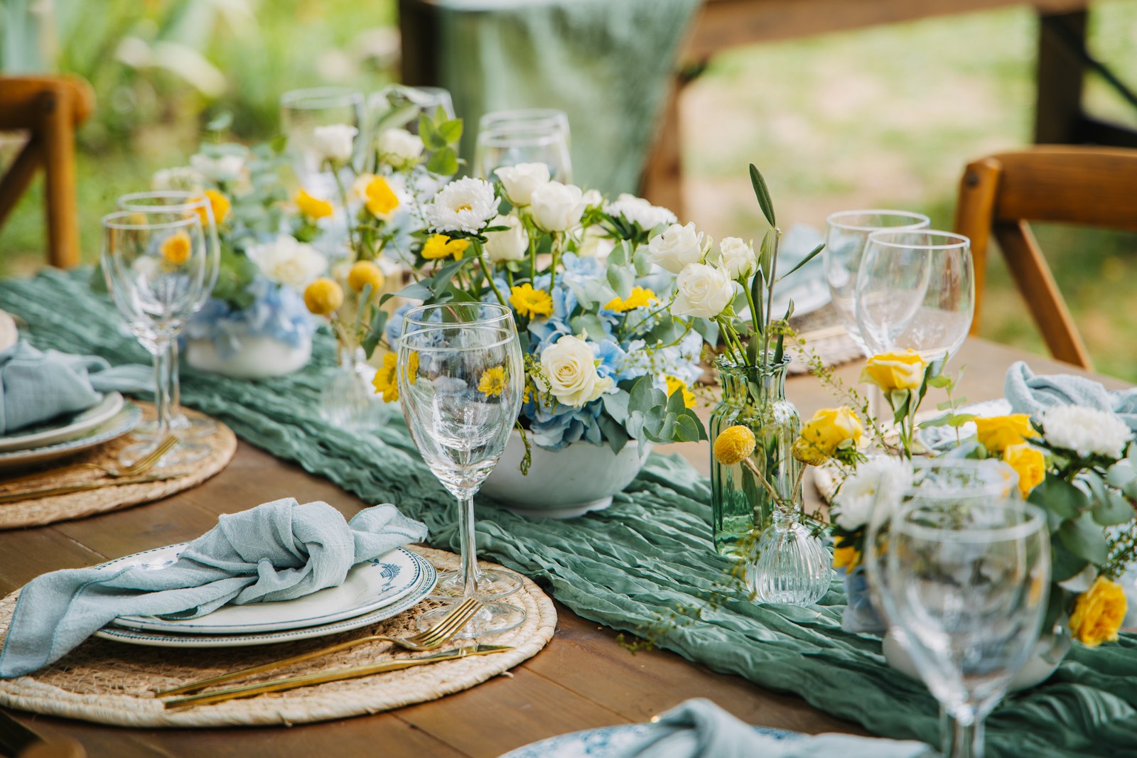 A styled table with posies and a green runner